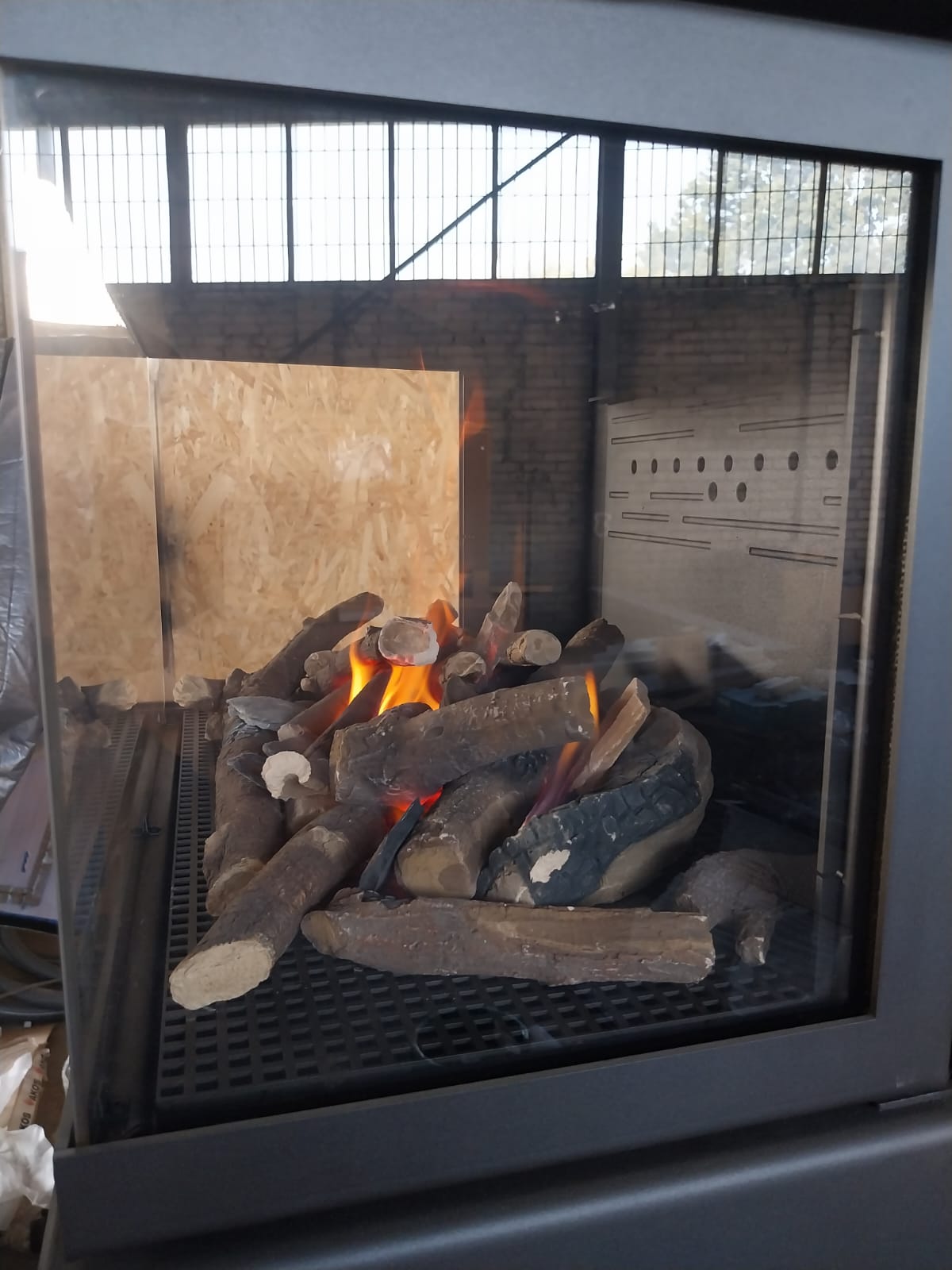 View from the right side of your three sided Direct Vent - Sealed clean fireplace - This is The Handmade Direct Vent KFD Ariana 3 Sided fireplace This is the Gas Model of the 3 sided see through ariana fireplace- Direct Vent Handmade to order. Modern Fireplace Mid Century Modern Cone style see through room center ready fireplace- Gas or Wood