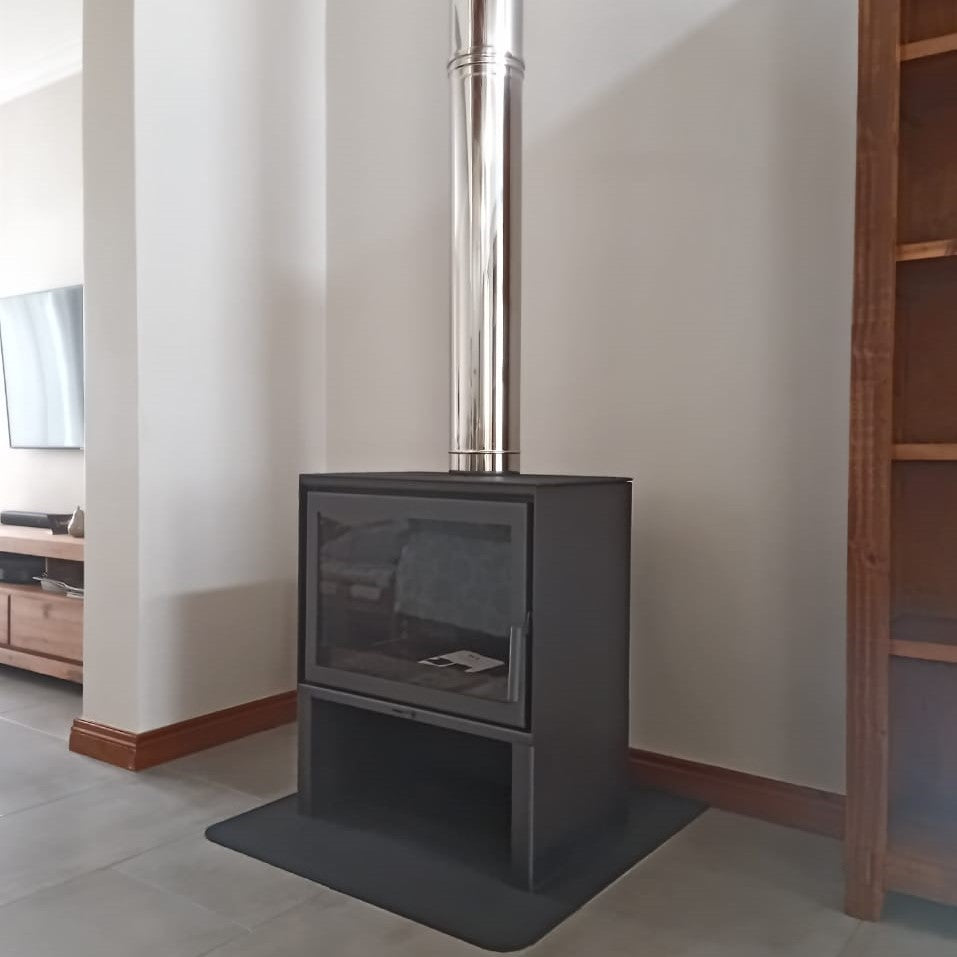 Freestanding Stove with base for wood storage this is the hand Made KFD Sto max. the Whitney by KFD is one of the best cast iron stoves for heating you home, cabin or barndominium