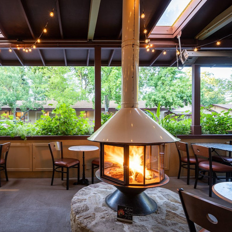 White Malm Carousel fireplace- perfect fireplace for the designer of a nice restaurant