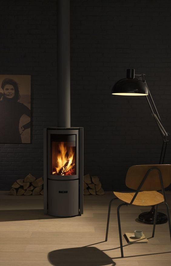 Corner Fireplace long burning freestanding Jotul Style Stuv 30 Compact Fireplace MCM Modern Sleek Scandinavian designed Canadian STUV Fireplace