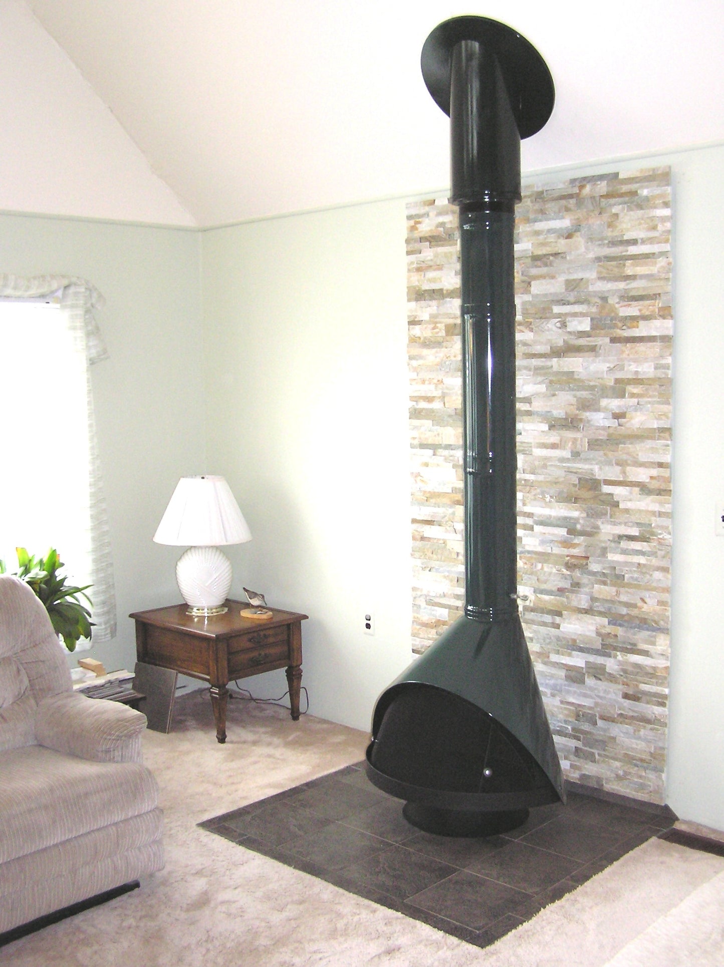 Custom Tiger Coatings Green High Sierras Mid Century Modern Fireplace with the Black Base. they come with the available matching base