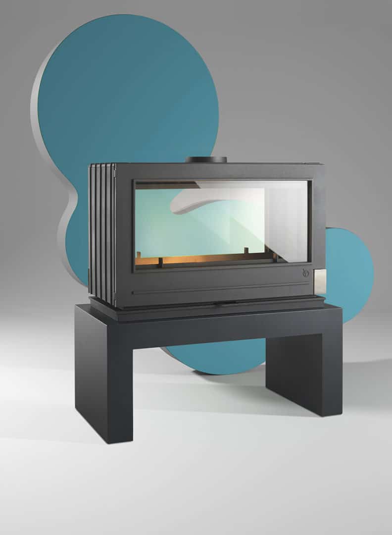 Double sided Modern Cast Iron Fireplace. Handmade in France with tempered glass and clean glass technology to keep your glass clean and make for an easy fire to build and maximum heat release for your room.