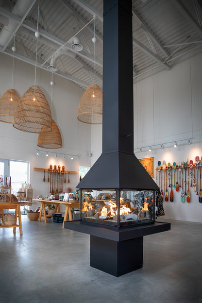 Modern interior with a large black freestanding Don bar 9200 series fireplace.