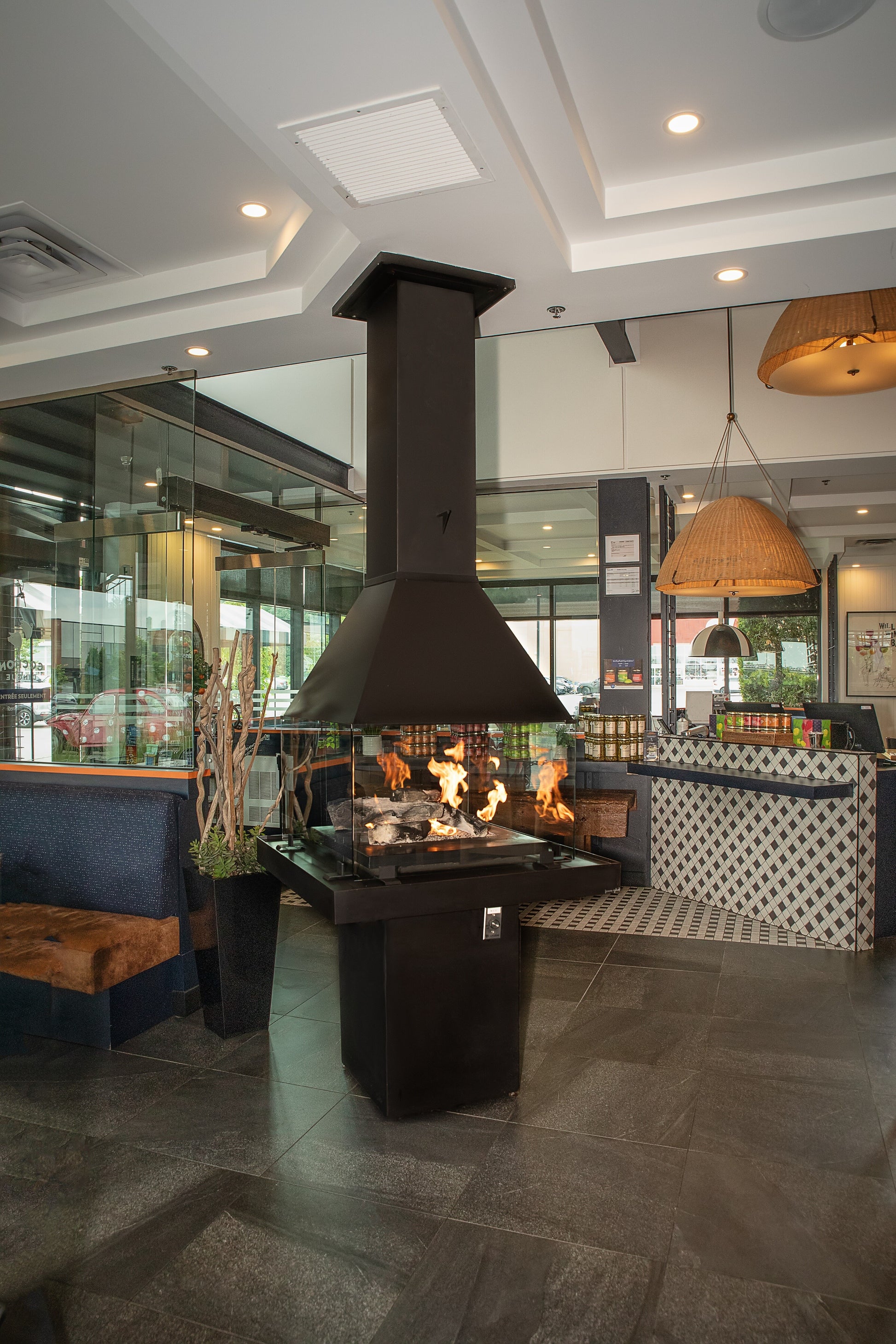 Modern interior with a Matte Black Don Bar 9200 series fireplace and stylish decor