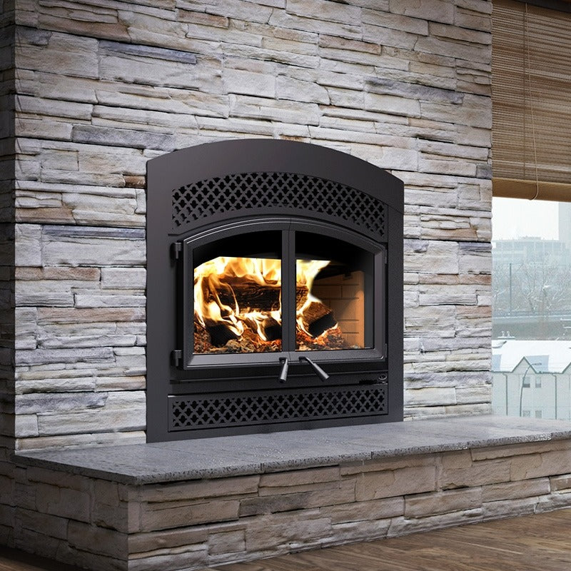 Valcourt Waterloo FP15A Indoor Built-in Wood burning fireplace with Arabesque faceplate louver and a visible wood burning flame. 95,000 btu, 11 hr burning time, Largest model with high efficiency. Valcourt Waterloo FP15A is similar to, Napoleon High Country Series Wood Burning Fireplace, Ventis HE350 Zero Clearance Fireplace Insert Wood Burning 95,000 BTU 2,800 Sq. Ft New, Osburn Stratford II Wood Fireplace with Door, Majestic WarmMajic-II Wood Fireplace - WARMMAJIC-II.