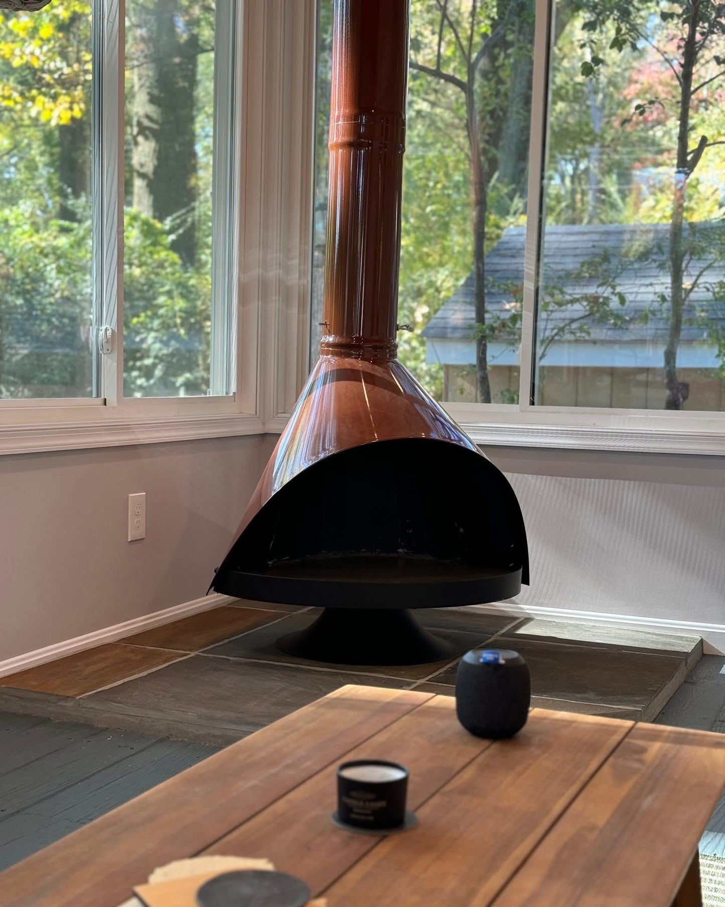 Terra Cotta Wood Burning Fireplace from Malm the Zircon is a cone style Mid Century Modern Fireplace that works in an open room or corner also works as an outdoor fireplace as well