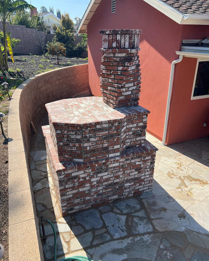 Brick outdoor Wood-fired pizza oven DIY KIT with wood storage on a patio outdoor kitchen setup ready to make your perfect outdoor kitchen. CBO 1000 wood fired Pizza Oven, natural gas pizza oven, DIY pizza oven kit, residential countertop pizza oven, Chicago Brick Oven, backyard pizza oven, outdoor kitchen pizza oven, hybrid pizza oven for home. Alfa Pizza Oven 3 pizze but better made in America, Wood Burning oven -Ooni Gozney.