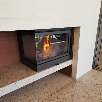 Black finish wood burning stove Dorako sto M 14 Left corner fireplace with a burning fire view in a modern living.
Cast iron freestanding Wood burning close combustion fireplace with Two-Sided Viewing. The Corner Two-Sided wood stove brings an unused space to life, either left- or right-facing. It is a nove
Dorako sto M 14 R is similar to Montigo DIVINE Multi Corner Gas Fireplace | H38CL/CR, Majestic Trilliant 30 Freestanding Direct Vent Gas Fireplace - TRILLIANT30, Napoleon Wood Stove 1450 Independence