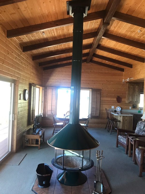 Forest Green Malm MCM fireplace this is the wood burning carousel with the black base