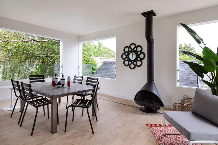 Matte Black B Vent Malm (you can tell by the fire grate) the Direct Vent has a glass front and is Sealed off from Room Air