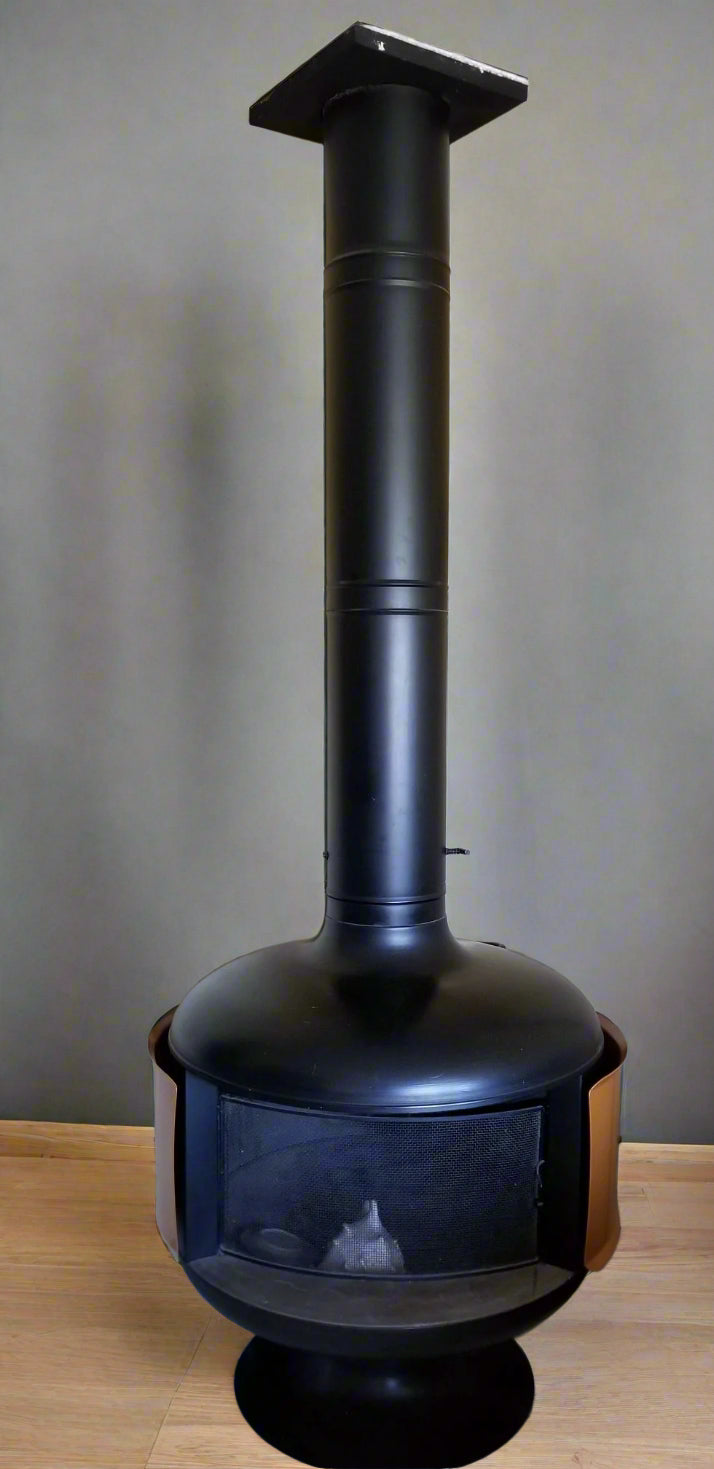 matte black MCM Fieplace with copper heat sheild