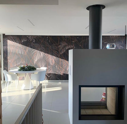 Modern kitchen with stuv 21-95DF in a dining area, and decorative wall art.