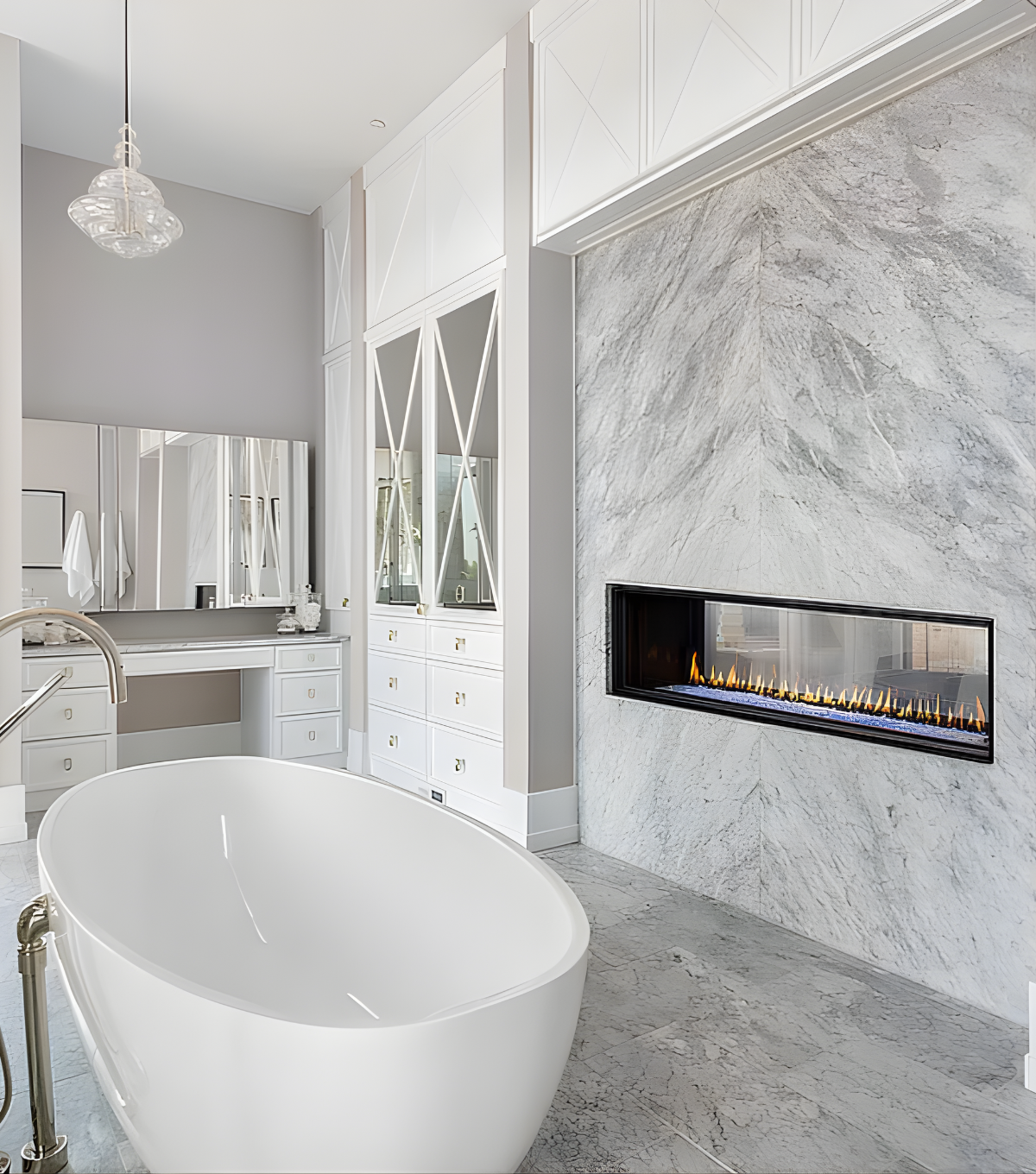 Montigo Distinction Built-In Linear Gas Fireplace Inserts into a Marble Wall that connects Modern bathroom with a Bathtub to a Room. Eco-Friendly Direct Vent Gas Fireplace with visible flame to uplift your space.