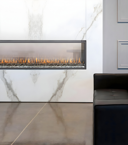 Gas Burning Built-In double sided Montigo exemplar See Through Gas Fireplace inserts into a marble like wall with visible flame in a modern living room. Direct Vent Linear Gas Fireplace Ideasthat connect your spaces together.
Create a modern look with one of our many exquisite Direct Vent Model linear fireplaces. This Eco-friendly Montigo Exemplar is similar to 48" Isokern Maximus Linear Gas Fireplace, Napoleon Clearion Elite See-Through Fireplace, Empire 48" Boulevard Direct Vent See-Through Linear Gas.