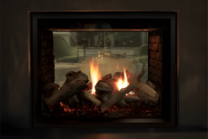40" Montigo Paragon See Through Built-In Direct Vent Gas Fireplace Inserts Into a wall with a black surround and Visible flames. Eco-Friendly Indoor Fireplace. Brand Accuracy	Montigo Paragon 40, TruFlame Technology, Direct Vent.
Visual Descriptors	Sleek design, massive flame, double-sided glass, "fish tank" view.
Competitor Targets	Barbara Jean Outdoor Fireplace, Regency City Series, Napoleon see-through.
Use Case	Commercial patio heater, indoor-outdoor fireplace, luxury backyard fire feature.
Installation	