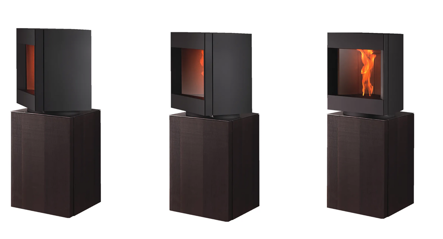 Pivot heading of free standing Stuv S-P10 pellet stove with visible burning flame. Modern Indoor remote control and Smart phone control Home heating fireplace. Eco-Friendly, Gentle flame Indoor fireplace. This Fireplace is similar to ComfortBilt Alpine HP40 Pellet Stove, Osburn Volta Pellet Stove, Quadra-Fire Outfitter II Pellet Stove Display Demo,US Stove 1300 Sq ft Wood Pellet Stove, Castle | Serenity Pellet Stove.