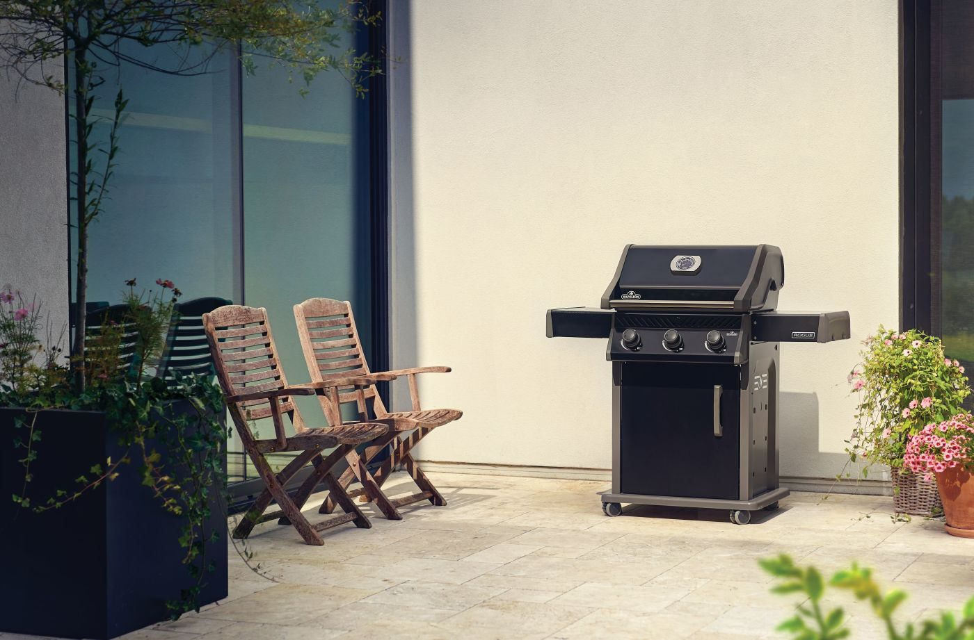 Outdoor view of black napoleon rogue series 425 gas grill