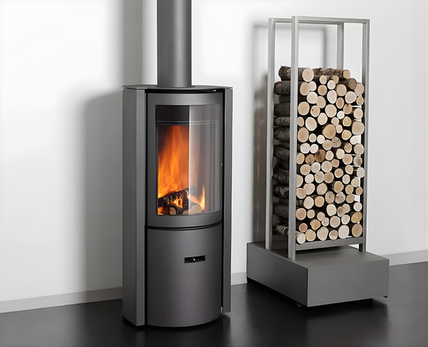 Modern stove with fire burning inside, next to a metal log holder filled with wood. 
modern fireplace
designer fireplace
luxury fireplace
beautiful fireplace
modern wood fireplace
contemporary fireplace

STUV 30c
rotating wood fireplace
clean burning fireplace
European fireplace design
Focus fireplace alternative
Ortal fireplace alternative
Rais fireplace Malm fireplace
 modern linear fireplace
SEO-Optimized Short Product Paragraph Stuv 30C wood burning stove with 

The Stuv 30c is a high-performance, frees