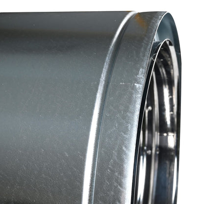 Side close-up view of stainless steel duratech II chimney pipe showing a circular opening at the side with metal wall. Exceptional factory-built all-fuel chimney pipe, lightweight design, double-wall, air-cooled chimney system for use with masonry fireplaces which burn wood, oil, coal, or gas.