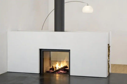 Thin edge frame stuv 21-95DF in a white painted room with a white front panel, black chimney and a curve lamp at the back