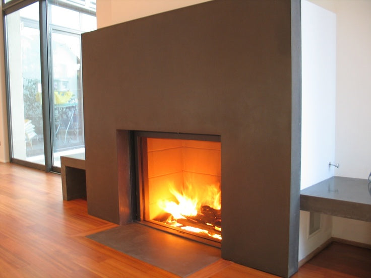 Thin edge frame Stuv 21-95DF with a grey front panel and a glowing flame in a modern living room 