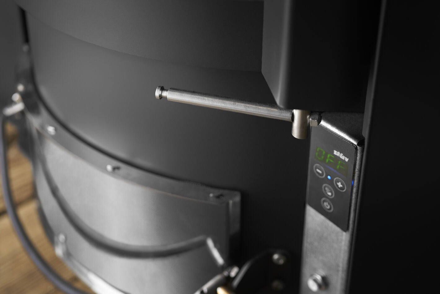 Matte Black Stûv P-20S Freestanding Modern Indoor pellet burning stove in large close spade with visible burning flame and pellet twin set container beside the fireplace. Elegance, silence, performance, ease of use and maintenance Fireplace. This pellet stove is similar to Stûv 30 Wood Stove | Compact Glass Fire Screen Stove | 360° Adjustable Rotating Wood Burning Stove With Double Walls, Osburn Aduro H1 Pellet/Wood Combo Hybrid Free Standing Stove SF00401, Comfortbilt Pellet Stoves HP50 Brown Modern Design