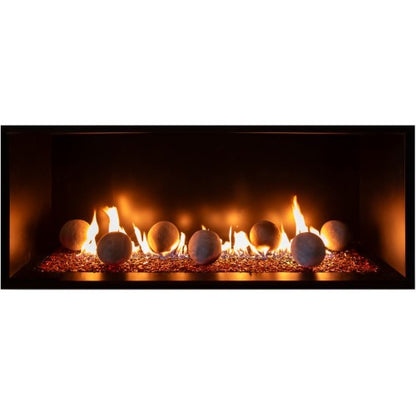Up close view of contemporary Gas Glass Fireplace with flames burning in a dark setting