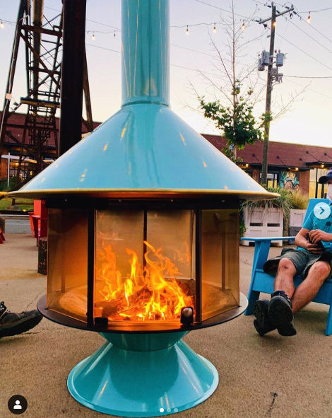 Turquoise Malm MCM Fireplace is an indoor outdoor fireplace that brings elegance and style to the room or patio. this is a great  patio heater. it can be supplemented by the Bromic patio heater as well. This here is the wood Burning MALM MCM 