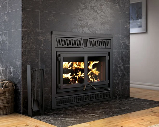 Valcourt Waterloo wood burning wall built-in fireplace with visible wood burning flame in a modern living room, 95,000 BTU/h High efficiency modern indoor wood fireplace with 1,000 -2,800 square feet heating area. Lab tested fireplace and this fireplace is similar to, Valcourt Dallaire II Wood Burning Fireplace fp18r, Osburn Stratford II Wood Fireplace, Napoleon Oakdale Wood Burning Fireplace Insert, True North Tn20 Wood Burning Fireplace Insert, Empire Stove Archway 2300 Wood Burning Insert WB23IN.