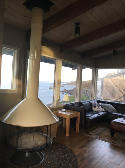 White Malm witha  beach view- this beach home has one of our beautiful MALM CAROUSELS in it and they love it