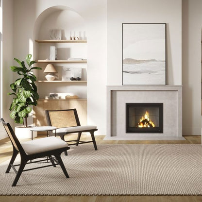Valcourt Antoinette Black Built-in indoor wood burning fireplace with mansory trim, guillotine-style door and visible wood visible wood burning flame. Heating area up to 1,000 sq. ft, EPA qualified. Antoinette Modern hearth fireplace is similar to Majestic Biltmore Wood Burning Fireplace - 50", Supreme Astra Single-Sided Wood Burning Fireplace, Empire Aspen Traditional Wood Burning Fireplace, Montigo Divine Bay H38DFPRC Direct Vent Gas Fireplace.
