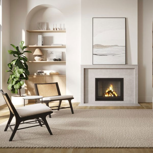 Valcourt Antoinette Black Built-in indoor wood burning fireplace with mansory trim, guillotine-style door and visible wood visible wood burning flame. Heating area up to 1,000 sq. ft, EPA qualified. Antoinette Modern hearth fireplace is similar to Majestic Biltmore Wood Burning Fireplace - 50", Supreme Astra Single-Sided Wood Burning Fireplace, Empire Aspen Traditional Wood Burning Fireplace, Montigo Divine Bay H38DFPRC Direct Vent Gas Fireplace.
