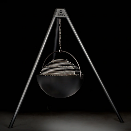 Cowboy Cauldron Tripod stand Moveable Wood Burning Fire Pit.
Used in the garden, this Cauldron is able to be moved anywhere - because it will not heat up the ground under it, move it to have a fire anywhere you please. Cowboy Cauldron the Wrangle 36": can be a grill can be a patio heater and is a beautiful piece of art work. Used in the garden, the Cow Cauldron is able to be moved anywhere - because it will not heat up the ground under it, move it to have a fire anywhere you please. Cowboy Cauldron the W