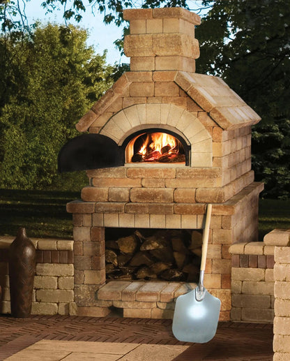 Brick outdoor Wood Wood fired pizza oven with wood storage on a patio outdoor kitchen setup ready to make your perfect outdoor kitchen. CBO 750 Hybrid Pizza Oven, dual fuel pizza oven, outdoor wood fired pizza oven, natural gas pizza oven, DIY pizza oven kit, residential countertop pizza oven, Chicago Brick Oven, backyard pizza oven, outdoor kitchen pizza oven, hybrid pizza oven for home. Alfa Pizza Oven 3 pizze but better made in America  with built in Gas BBQ LPG NG Pizza Oven Wood Burning Ooni Gozney