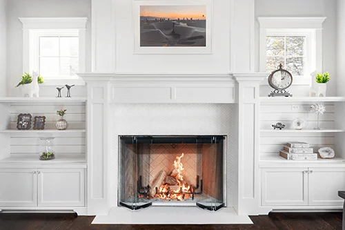 Traditional Torch Built-In Motigo Wildfire wood burning Indoor fireplace inserts into a white painted wall with visible burning flame in a Modern living room. 
Our wood fireplaces offer a clean design and a wide viewing area to enhance any part of your home and are available in a variety of dimensions. 
High quality hearth Fireplace similar to Comfort Flame Blackstone Series Wood-Burning Firebox, Osburn Everest II Wood Burning Fireplace, Majestic Biltmore 42 Inch Radiant Wood Burning Fireplace, Osburn.