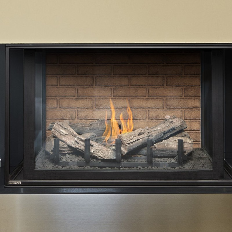 3 sided direct vent Montigo divine H38PR Bay Gas Fireplace Inserts into a wall with visible log burning media.
No need to chop, stack, or dry firewood. Gas fireplaces are incredibly easy to use and it offer the look of a wood fireplace with Remote control options making this the ultimate in heating convenience.
This product is similar to Sierra Flame Toscana 38" Three Sided Gas Burning Fireplace, 3 Sided Glass Open View Wide Angle Glass Fireplace by KFD, Dimplex Faber Matrix Built-in Gas Fireplace,Napoleon.