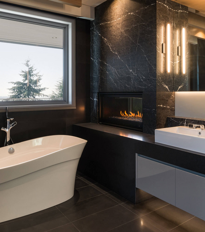 52" Montigo Phenom Gas Fireplace Inserts into a wall with visible flame. Black surrounds See-Through Direct Vent Indoor Fireplace Connecting a modern Bathroom  to living and dining areas.
This product is similar to Napoleon High Definition Direct vent gas fireplace, Napoleon High Definition,  Invicta Aaron See Through woodstove, Modern Flames Orion, Heat & Glo escape series See Through Fireplace.