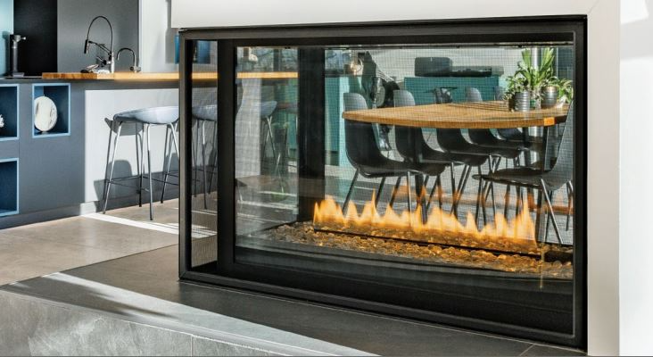 3 sided Direct vent Contemporary 38" gas fireplace inserts into a wall in a modern living room with visible flame.
premium 3 sided gas fireplaces provides mesmerizing ribbon of flame
This See through Modern Fireplace With its linear burner and captivating multi-sided design is similar to 3 Sided Glass Open View Wide Angle Glass Fireplace by KFD, Sierra Flame Toscana 48" Three Sided Gas Burning Fireplace, Heat & Glo Pier Three-Sided Fireplace PIER-DV36IN, Dimplex Faber Matrix Built-in Gas Fireplace FMG4126B.