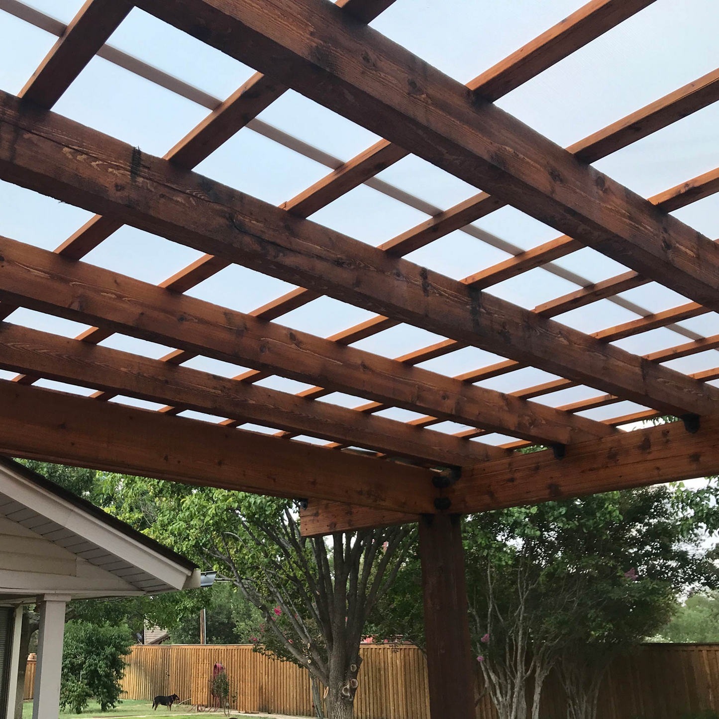A roof covered with solexx greenhouse panel roll