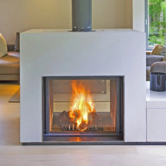Stuv 21-95 Double sided wood burning stove with white Front panel and grey direct vent and a burning flame in the stove positioned in a living room setting