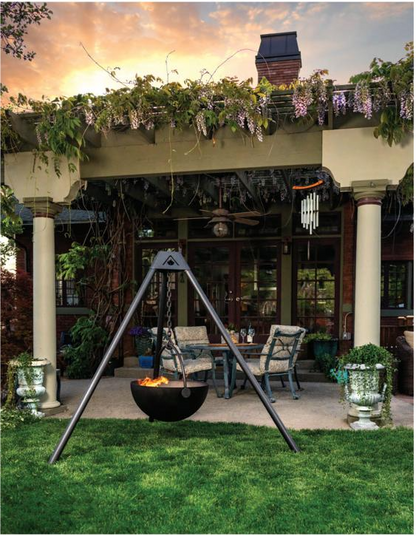 Tripod Stand 'The dude' Wood Burning Fire Pit placed at backyard with a burning flame Modular Fire Pit. BACKYARD SOPHISTICATION, IN A MODULAR FLOATING FIRE PIT PIECE DESIGNED TO BE FUNCTIONAL AND ARTISTIC

The cowboy Cauldron Wrangler is a Modular Floating Firepit that with not only heat up the night, but wow your guests with its beauty and craftsmanship.&nbsp;

Made Right here in the USA the Cowboy Cauldron is a one of a kind outdoor patio feature, that is easily moved to be anywhere and still have your 