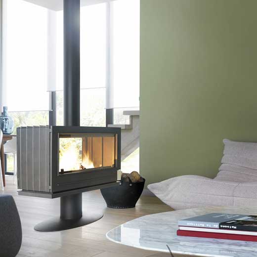 Clean glass The clean glass system slows deposit buildup on the glass. An air supply above the glass creates a protective curtain. The preheated air is propelled along the glass. It triggers combustion of gas and volatile materials, thereby protecting the glass against smoke and soot deposits.  Double opening Unit has two doors. Ideal for separating two rooms to reload the wood from one side to another.