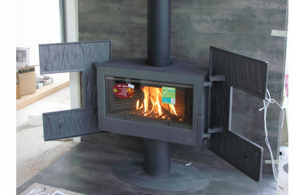 French door Modern Wood Stove- Largest wood burning stove with longer logs than most others Up close Dual Door And Glass covered Wood burning stove with clean burning "Invicta Gaya Ardoise 12kW wood burning stove featuring 8-hour extended burn time and clean glass airwash system." Contemporary designer wood stove; a cast iron alternative to the Focus Grappus or JC Bordelet suspended fireplaces Mid Century Modern Fireplace Invicta Gaya Ardoise modern cast iron wood burning fireplace with an organic slate-tex
