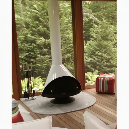 Porcelain Malm Fireplace Mid Century Modern style Brand New Fireplace Mid-century modern black Malm Spin a Fire cone fireplace installed in a living room with floor to ceiling windows.
 Authentic 1970s style Malm Spin a Fire rotating freestanding fireplace with modern hearth decor.
 Retro black conical rotating fireplace by Malm in a minimalist architectural space. Matte black Malm Spin a Fire freestanding conical wood stove rotating 360 degrees in a modern living room.
360 degree pivoting Malm Spin a Fire 